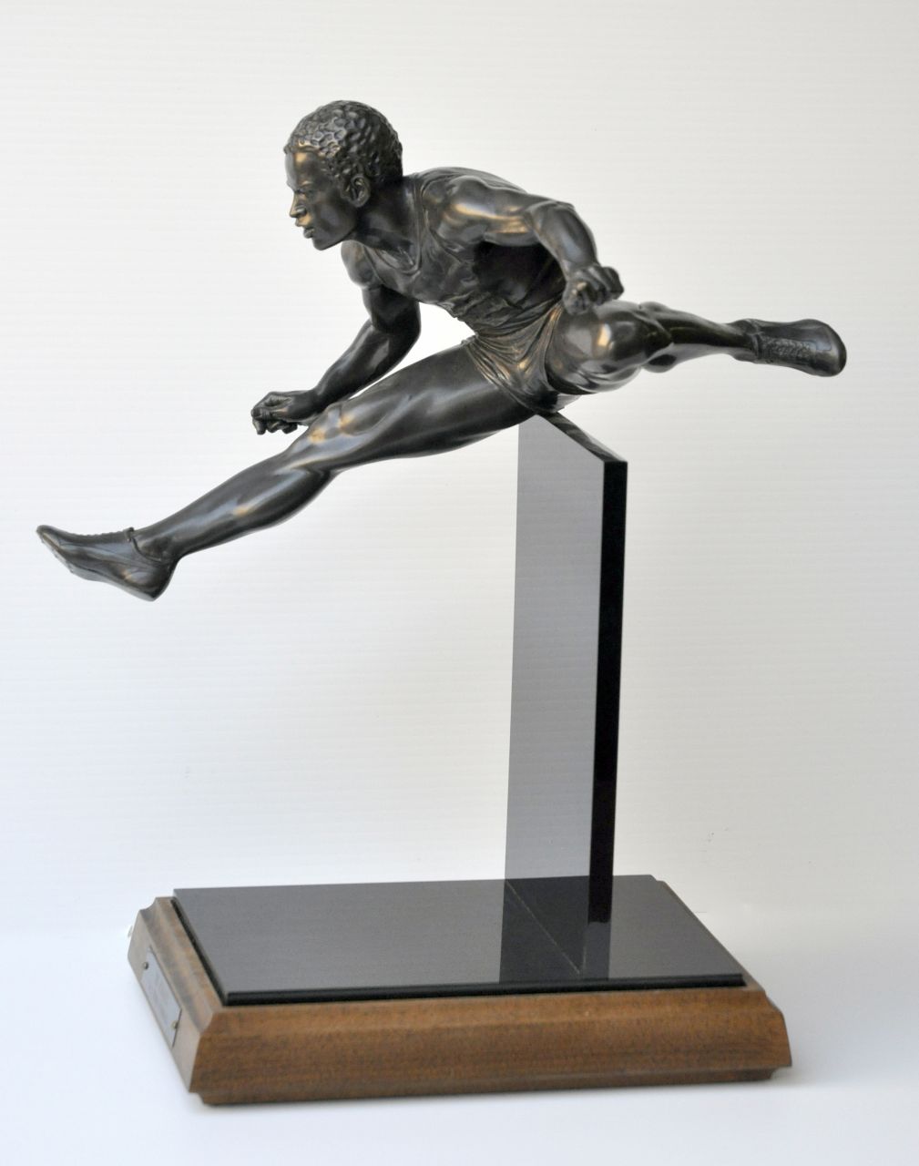 Schomberg A.T.  | Auldwil 'Thomas' Schomberg, The Hurdler, bronze and acrylic 46.1 x 22.0 cm, signed on the left foot, no. 8/18 and dated 1984