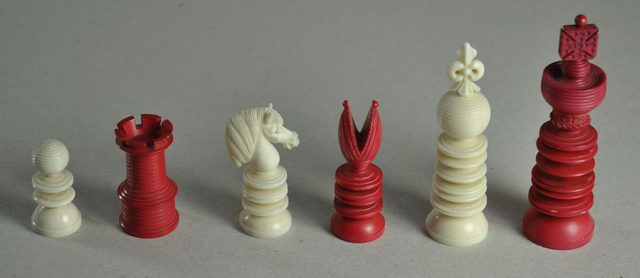 William Lund | An English William Lund chess set, ivory, 10.4 x 4.2 cm, signed stamped 'Will. m. Lund' on the base of white king and executed circa 1840-1870