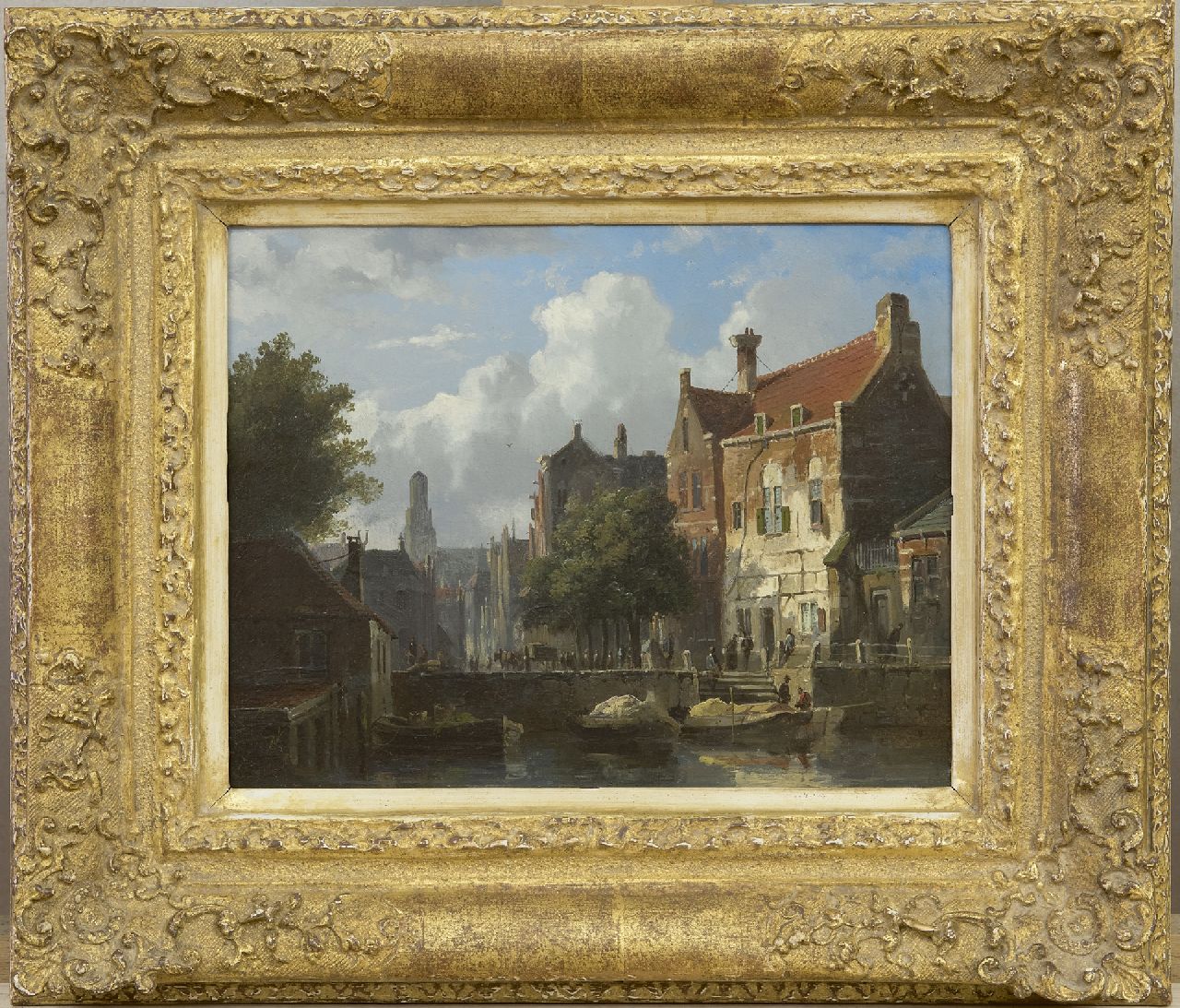 Eversen A.  | Adrianus Eversen, A town view with a canal, oil on panel 15.0 x 19.1 cm, signed l.l.