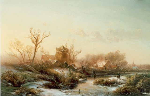 Pieter Kluyver | A snow-covered town, oil on panel, 27.2 x 43.3 cm, signed l.l.