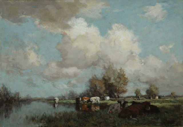 Johannes Karel Leurs | Cows along a river, oil on canvas, 47.3 x 67.2 cm, signed l.r.