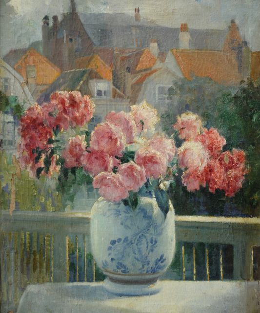 Franken J.H.  | Flowers in a vase on a balcony with townview, oil on canvas 61.7 x 50.2 cm, signed l.r. on the balcony railing