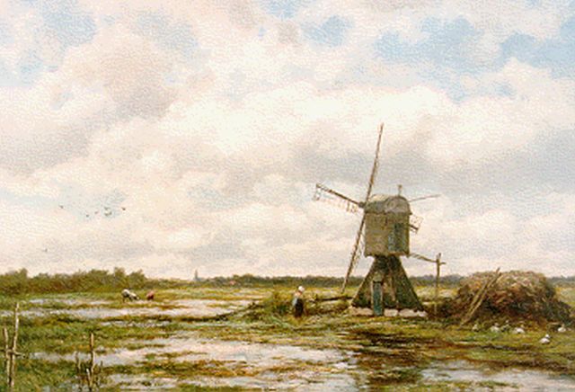 Koekkoek J.H.B.  | A windmill in a polder landscape, oil on canvas 51.0 x 72.8 cm, signed l.l.