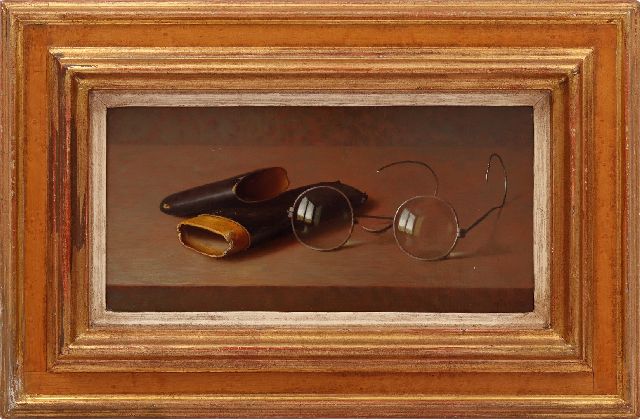 Andreas Gyula Bubarnik | Still life of a pair of glasses and a case, oil on canvas laid down on panel, 14.0 x 28.0 cm, signed l.r.