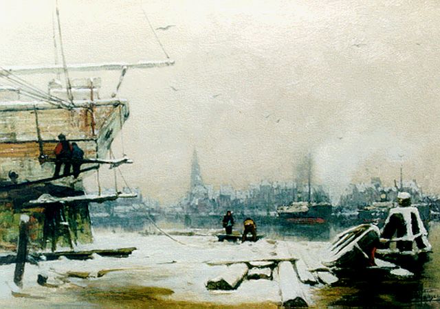 Jansen H.W.  | The harbour of Amsterdam in winter, oil on canvas 41.6 x 57.4 cm, signed l.r.